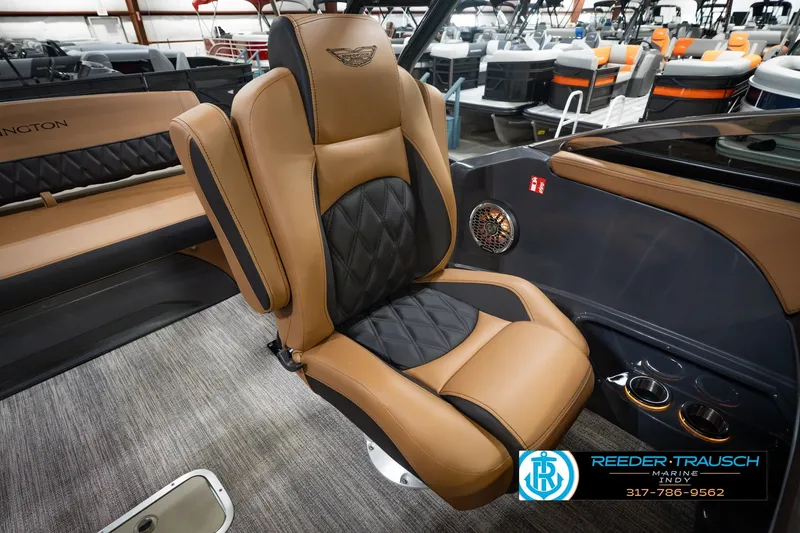 Slide: The Image of Luxurious seating in 2027 Bennington 23 RSWBA boat, featuring tan and black upholstery. - 30