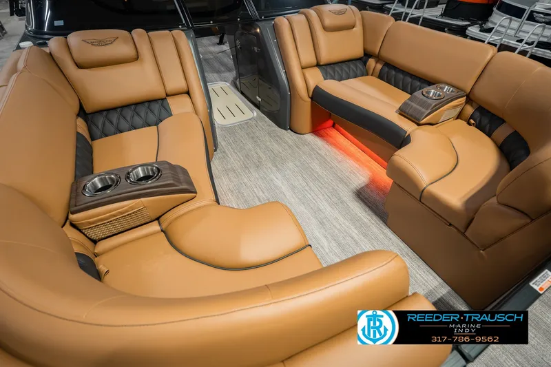 Slide: The Image of Luxurious interior of 2027 Bennington 23 RSWBA pontoon boat with tan leather seating. - 14
