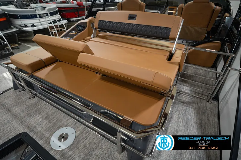 Slide: The Image of 2027 Bennington 23 RSWBA boat interior with tan seating and sleek design. - 35