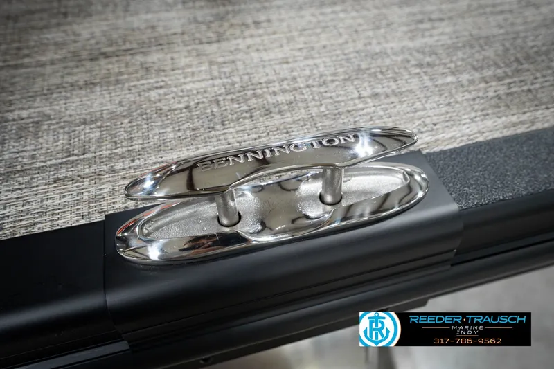 Slide: The Image of Chrome cleat on Bennington 23 RSWBA 2027 boat, textured surface, Reeder-Trausch Marine logo. - 61