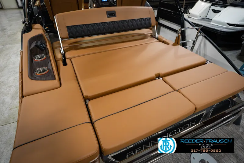 Slide: The Image of Luxurious seating on 2027 Bennington 23 RSWBA boat with tan upholstery and cup holders. - 49