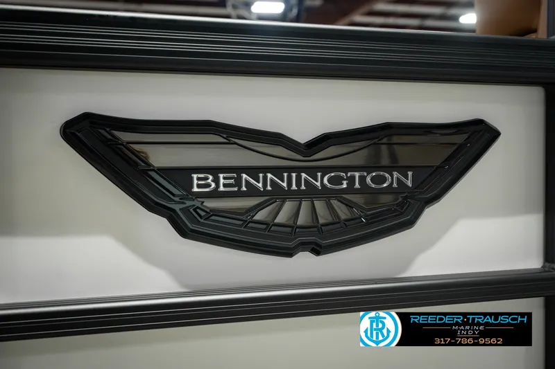 Slide: The Image of 2027 Bennington 23 RSWBA logo on boat, displayed at Reeder-Trausch Marine. - 54
