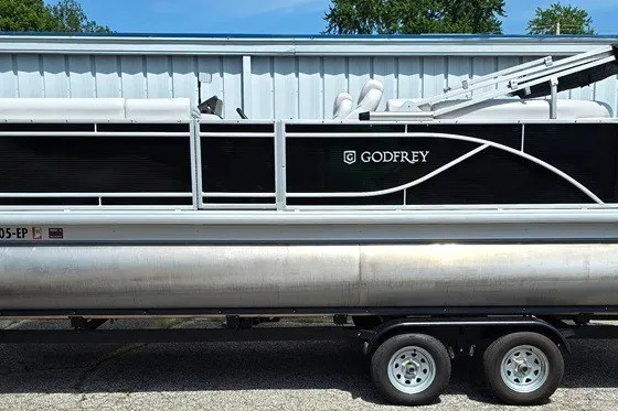 Slide: The Image of 2024 Godfrey Sweetwater 2286 SBC pontoon boat on trailer, side view. - 14
