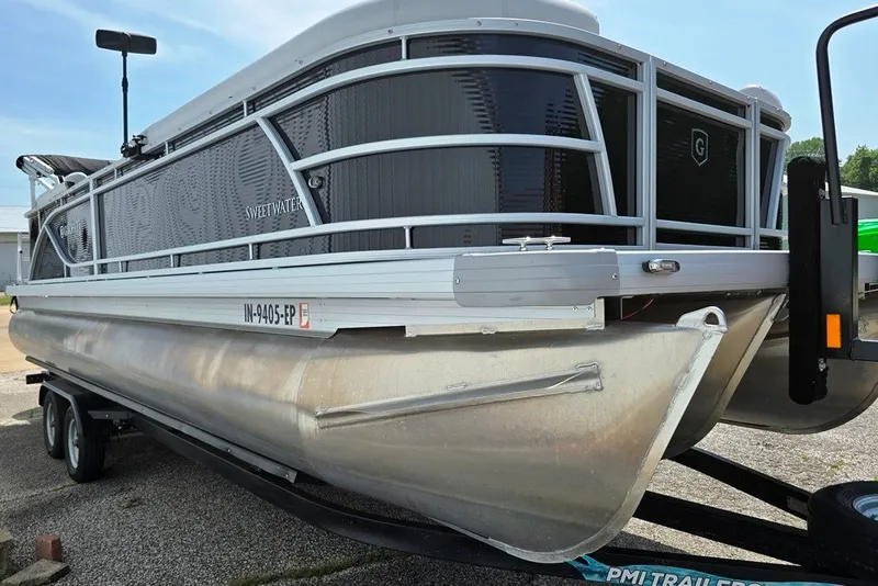 Slide: The Image of 2024 Godfrey Sweetwater 2286 SBC pontoon boat on trailer, side view. - 9