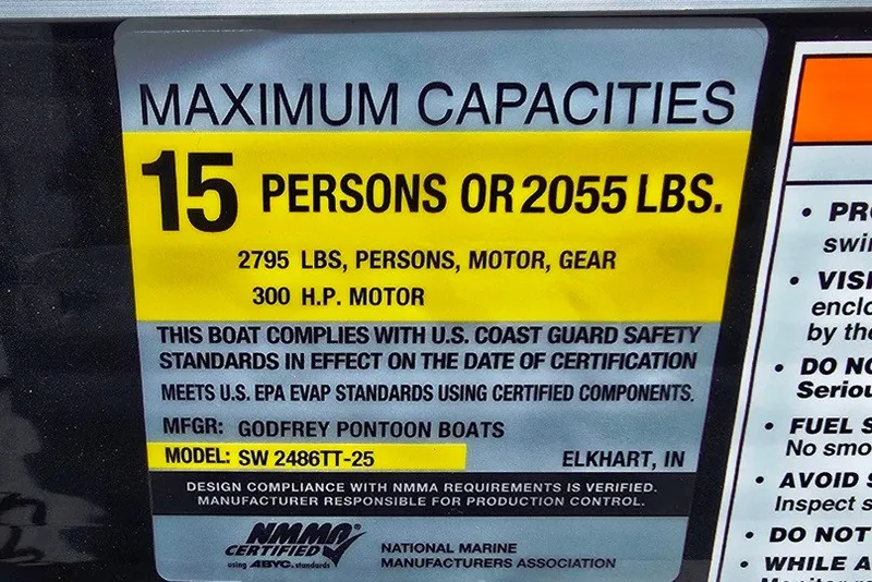 Slide: The Image of 2024 Godfrey Sweetwater 2286 SBC boat capacity label: 15 persons or 2055 lbs, 300 HP motor. - 13