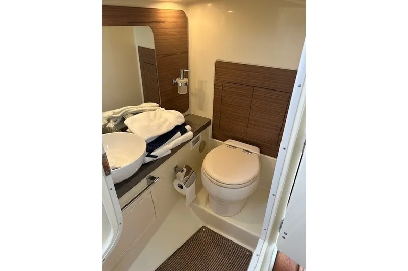 Slide: The Image of Luxurious bathroom interior of 2023 Chris-Craft Launch 31 GT boat. - 13