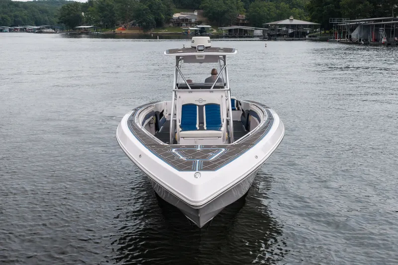 Slide: The Image of 2018 Fountain 38 Center Console boat on a calm lake. - 8
