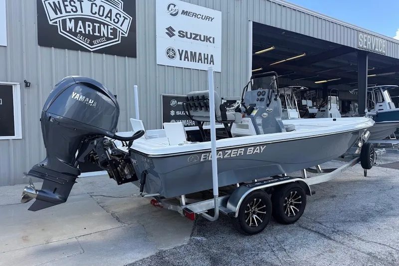 Slide: The Image of 2027 Blazer PureBay 2200 boat with Yamaha engine at West Coast Marine dealership. - 9