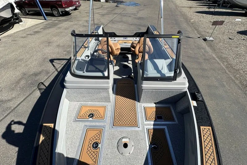 Slide: The Image of 2026 Starweld 18 SXR Sport boat with dual consoles and stylish deck design. - 5