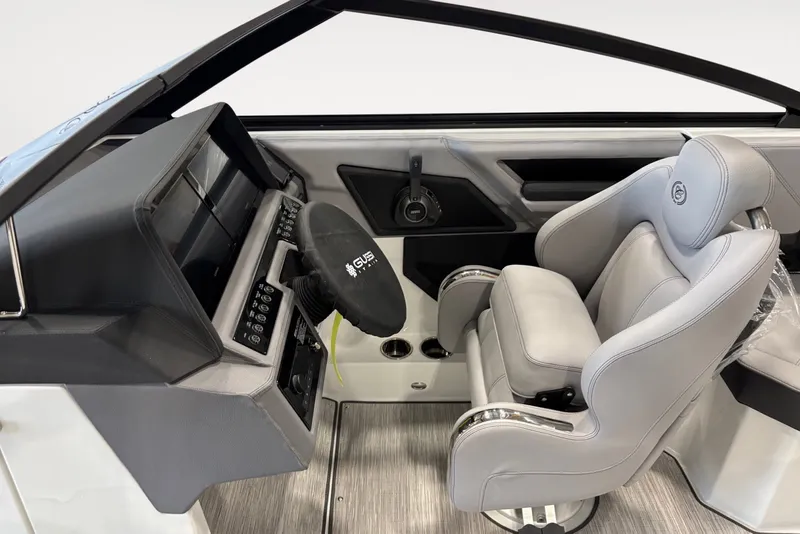 Slide: The Image of The image shows the cockpit of a 2026 Cobalt R4 boat with a modern helm station. - 7