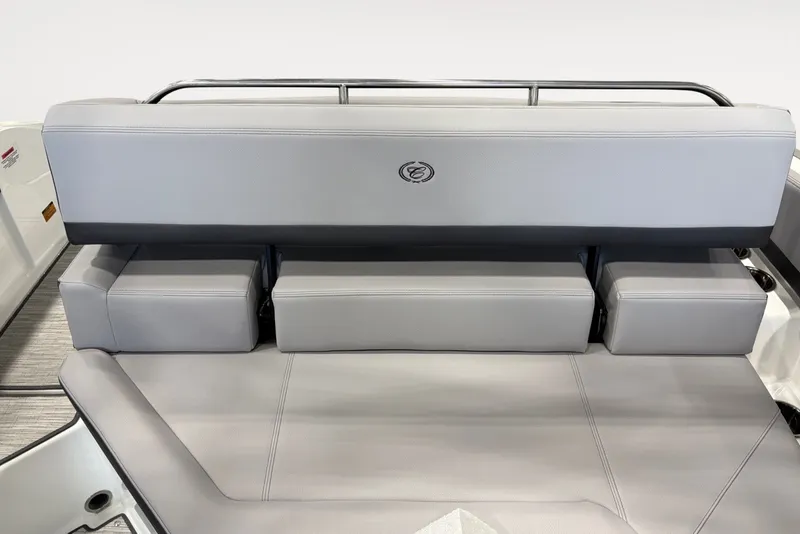 Slide: The Image of The image shows the rear seating of a Cobalt R4 boat with gray upholstery. - 10
