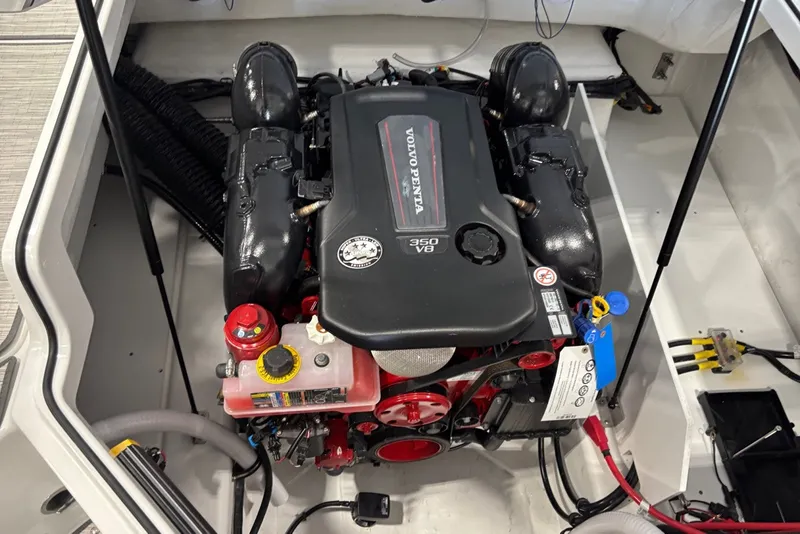 Slide: The Image of The engine compartment of a 2026 Cobalt R4 boat with a Volvo Penta 350 V8 engine. - 13