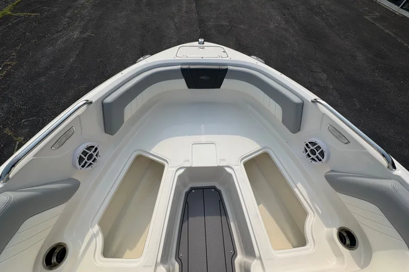 Slide: The Image of 2023 Chaparral 21 SSi boat interior with seating and storage compartments. - 17
