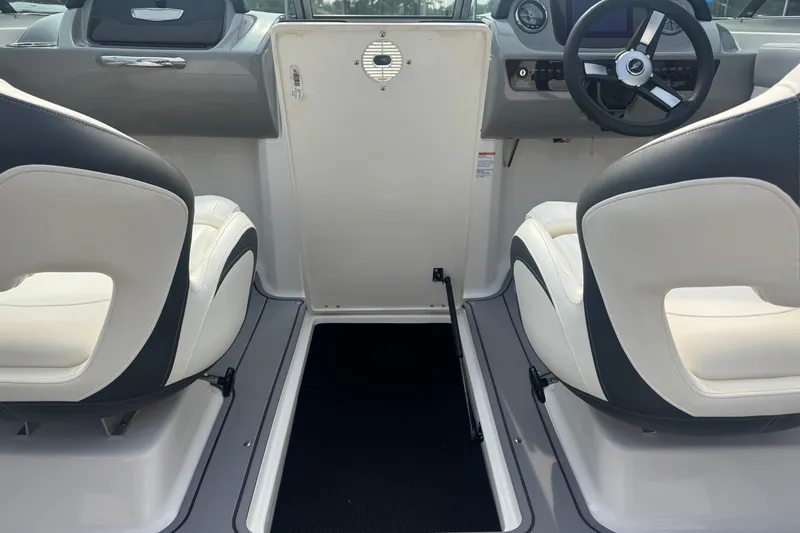 Slide: The Image of Interior of 2023 Chaparral 21 SSi boat with white and black seating. - 20
