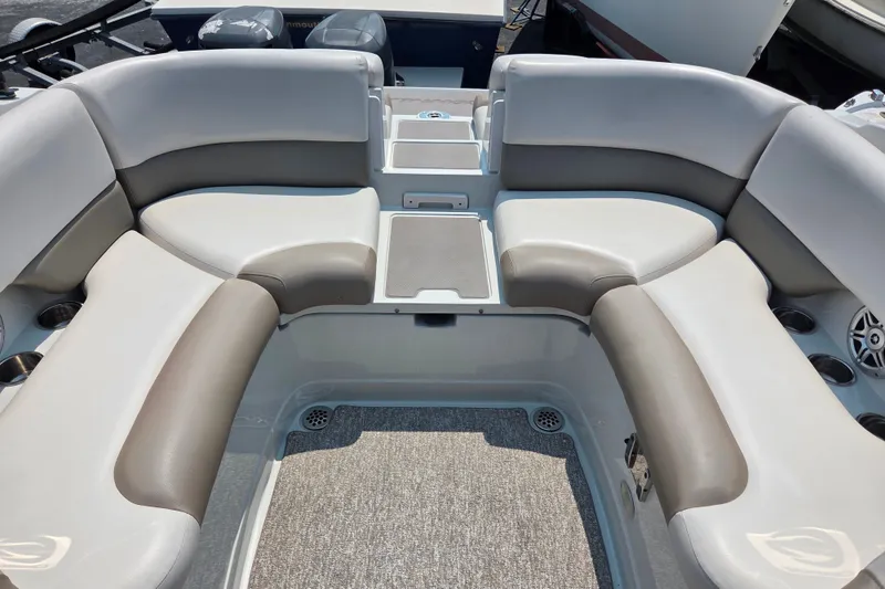 Slide: The Image of 2015 Crownline 255 SS boat interior with spacious seating and modern design. - 24