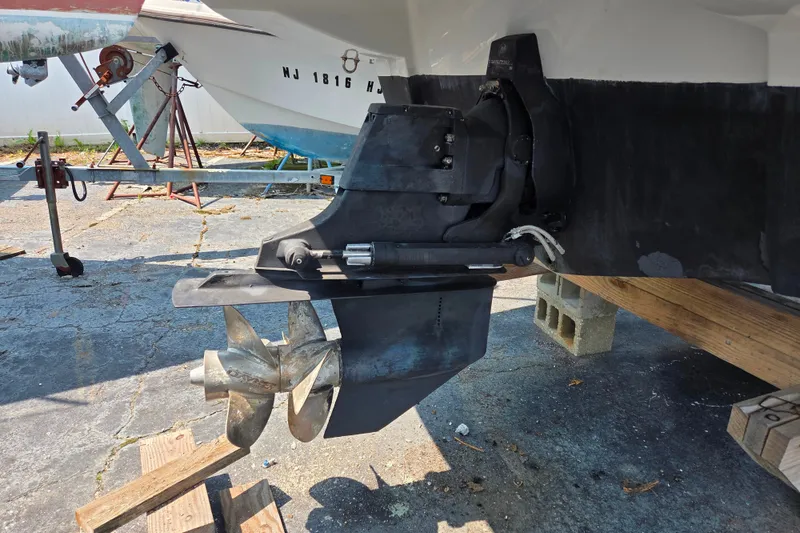 Slide: The Image of 2015 Crownline 255 SS boat propeller and stern drive on a trailer. - 13