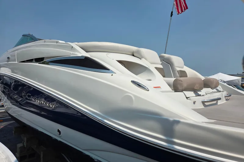 Slide: The Image of 2015 Crownline 255 SS boat with sleek design and comfortable seating. - 8