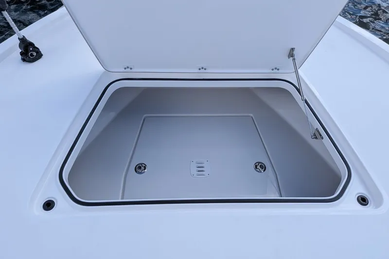 Slide: The Image of Open storage compartment on 2027 Caymas 28 HB boat, showcasing interior space. - 17