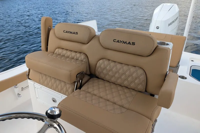 Slide: The Image of Luxurious seating on 2027 Caymas 28 HB boat with diamond-stitched upholstery. - 10