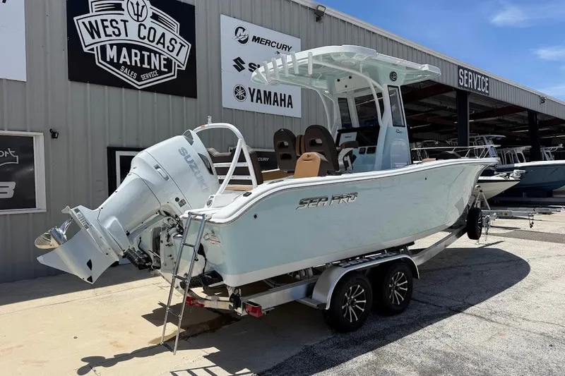 Slide: The Image of 2027 Sea Pro 245FLXR Sandbar boat on trailer at West Coast Marine dealership. - 8