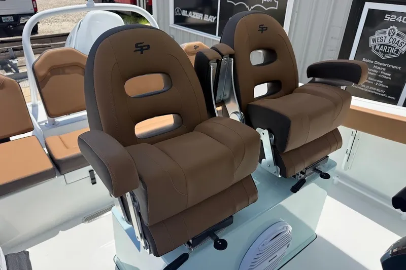 Slide: The Image of Brown captain seats on 2027 Sea Pro 245FLXR Sandbar boat, featuring ergonomic design. - 16