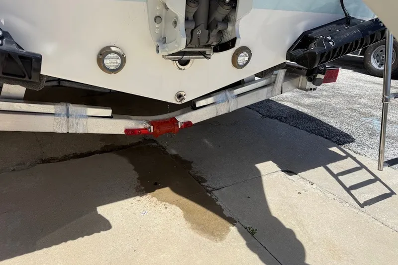 Slide: The Image of Rear view of a 2027 Sea Pro 245FLXR Sandbar boat on a trailer. - 11