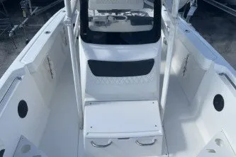 Slide: The Image of 2023 Trophy T22 boat interior with seating and storage compartments. - 11