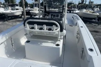 Slide: The Image of 2023 Trophy T22 boat interior with seating and rod holders. - 7