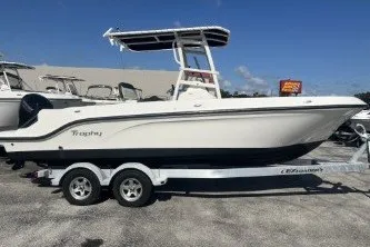 The Image of 2023 Trophy T22 boat on trailer, side view, sunny day. - 1