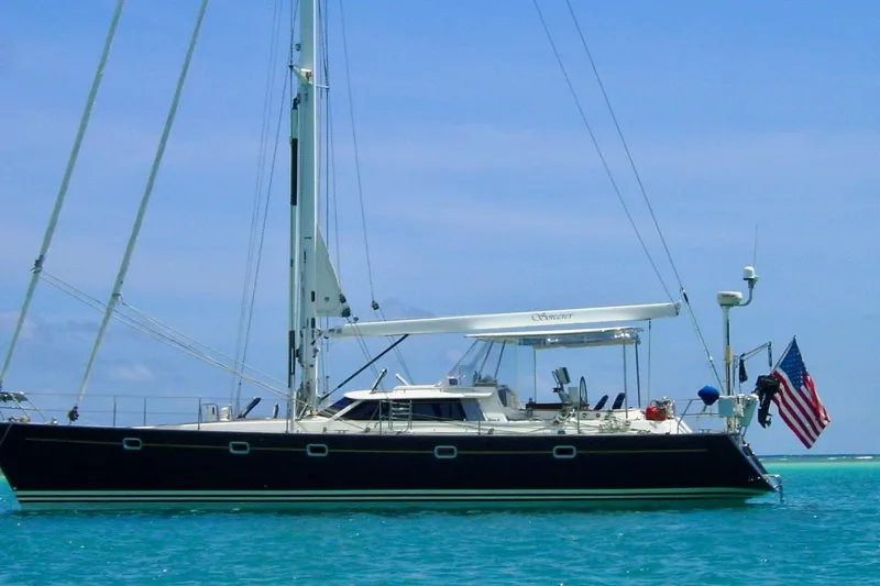 The Image of Sailing yacht Farr Pilothouse 50, 1999 model, anchored in turquoise waters under a clear sky. - 0