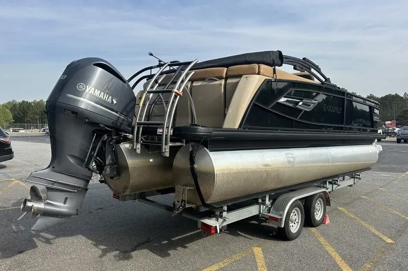 Slide: The Image of 2024 AquaPatio 235 UL pontoon boat on trailer with Yamaha outboard motor. - 17