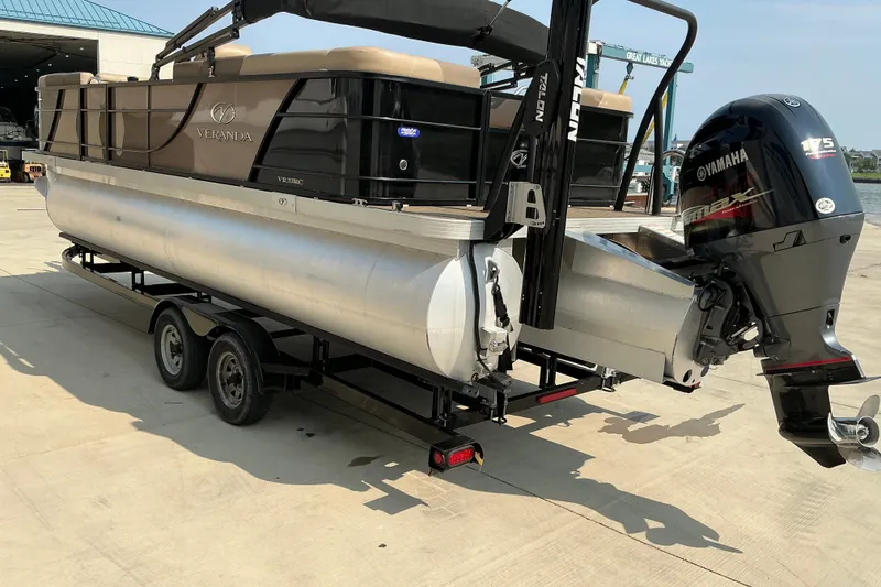 Slide: The Image of 2022 Veranda Relax VR22RC pontoon boat with Yamaha 175 engine on trailer. - 12