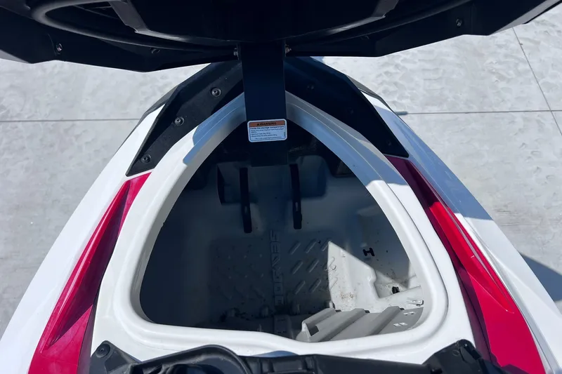 Slide: The Image of 2012 Sea-Doo Wake 155 storage compartment, open view, showing interior details. - 17
