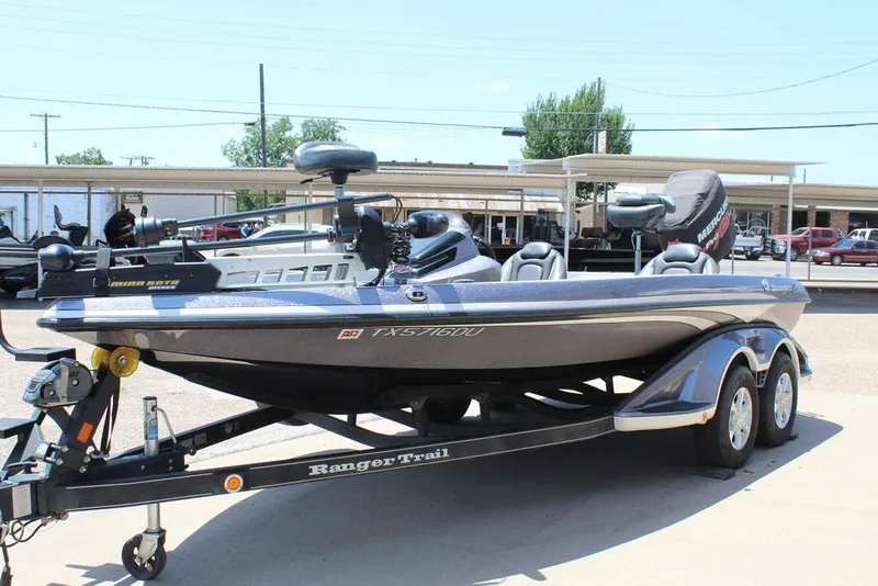 Slide: The Image of 2017 Ranger Z519 boat on trailer, featuring dual seats and a Mercury engine. - 18
