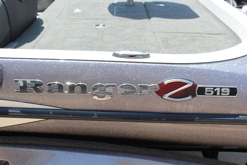 Slide: The Image of 2017 Ranger Z519 boat logo on metallic surface. - 21