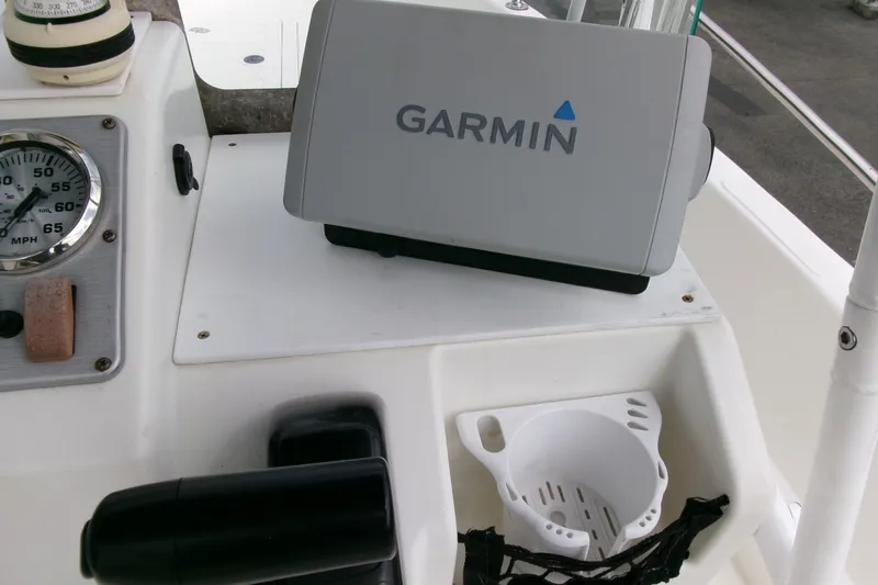 Slide: The Image of Dashboard of a 2014 Triumph 170 CC boat with Garmin GPS and speedometer. - 10