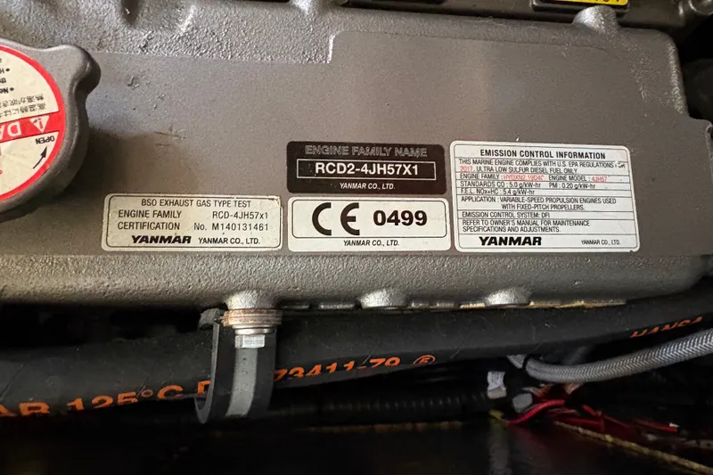 Slide: The Image of Yanmar engine label on a 2018 Hanse 455, showing emission control information. - 35