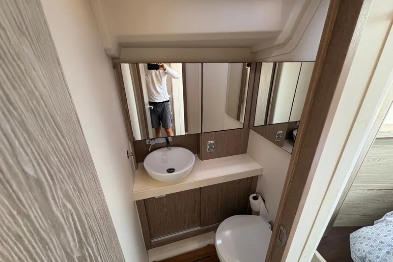 Slide: The Image of Bathroom interior of 2018 Hanse 455 yacht with sink and mirror. - 30