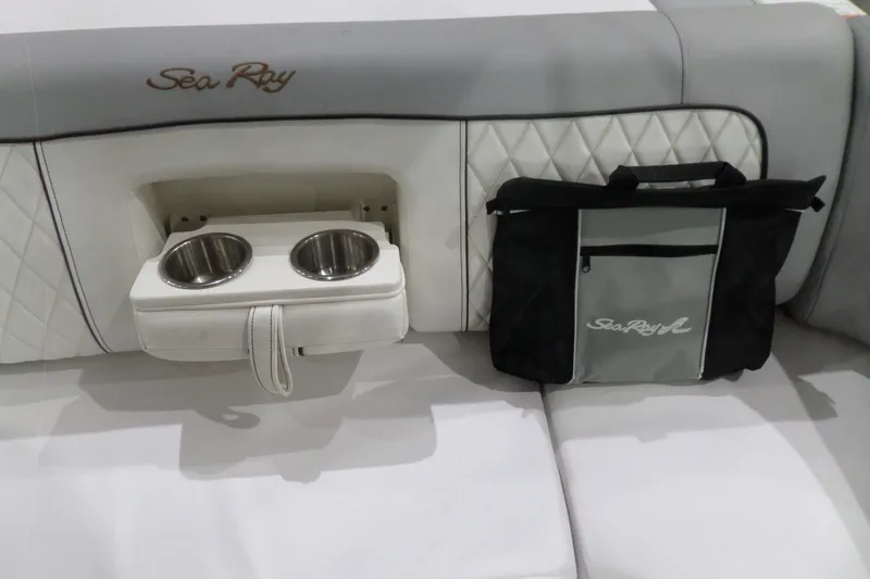 Slide: The Image of 2017 Sea Ray SDX 240 boat interior with cup holders and branded bag. - 47