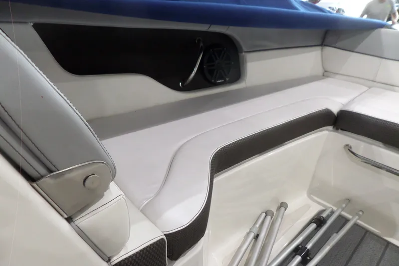 Slide: The Image of Interior seating of a 2017 Sea Ray SDX 240 boat with sleek design and storage space. - 38
