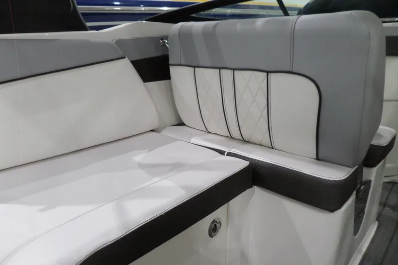 Slide: The Image of 2017 Sea Ray SDX 240 boat interior with elegant white and gray seating. - 22