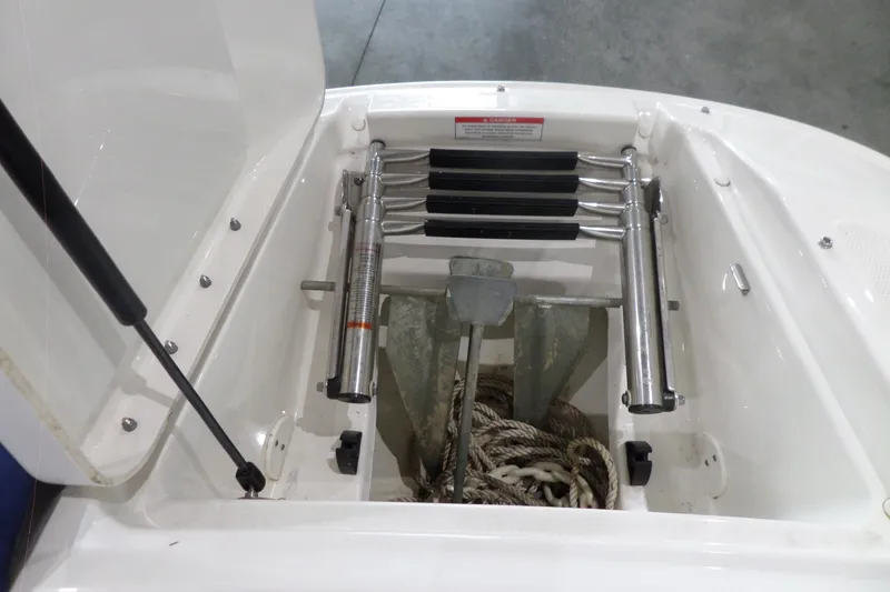 Slide: The Image of Storage compartment of 2017 Sea Ray SDX 240 boat with anchor and ropes. - 41