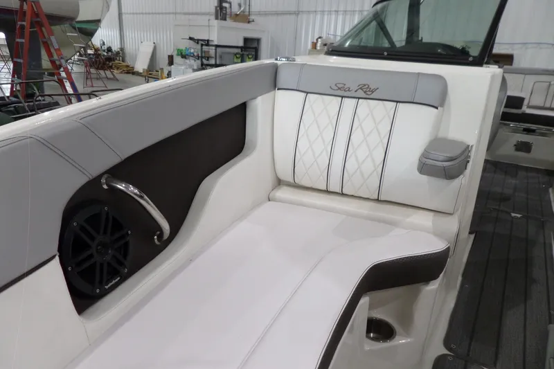 Slide: The Image of Interior seating of 2017 Sea Ray SDX 240 boat with elegant upholstery and speaker. - 42