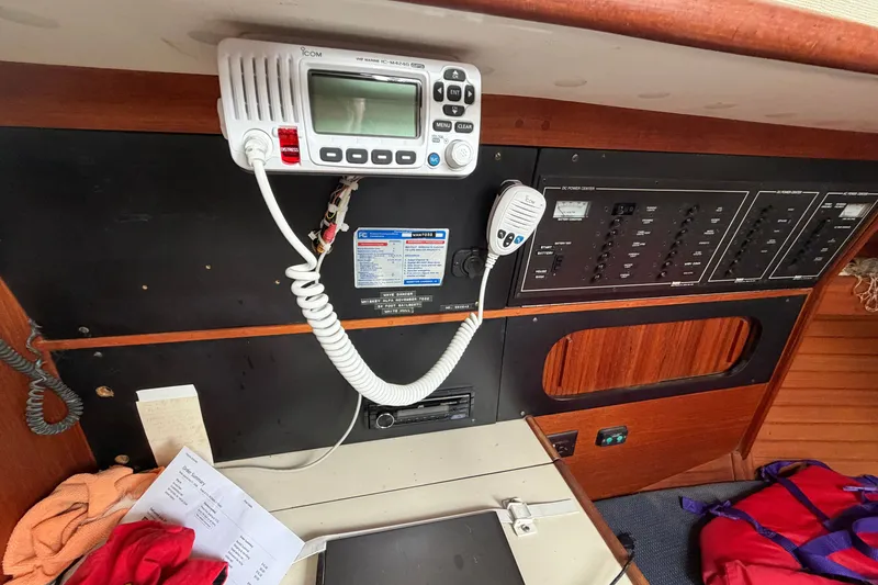 Slide: The Image of Control panel and radio equipment inside a 1990 Sabre 34 MK II sailboat cabin. - 38