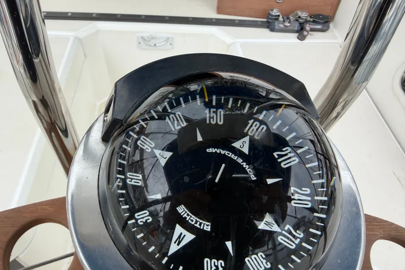 Slide: The Image of Compass on 1990 Sabre 34 MK II sailboat, showing direction and navigation details. - 20