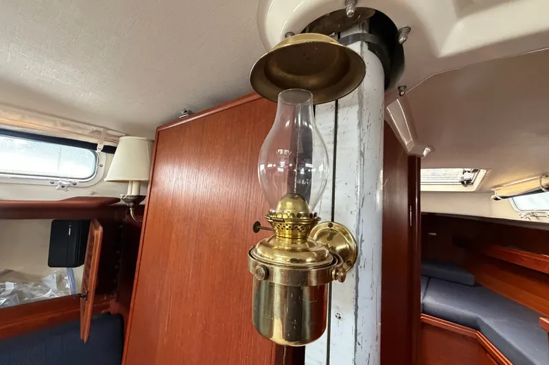 Slide: The Image of Brass oil lamp inside 1990 Sabre 34 MK II sailboat cabin interior. - 52