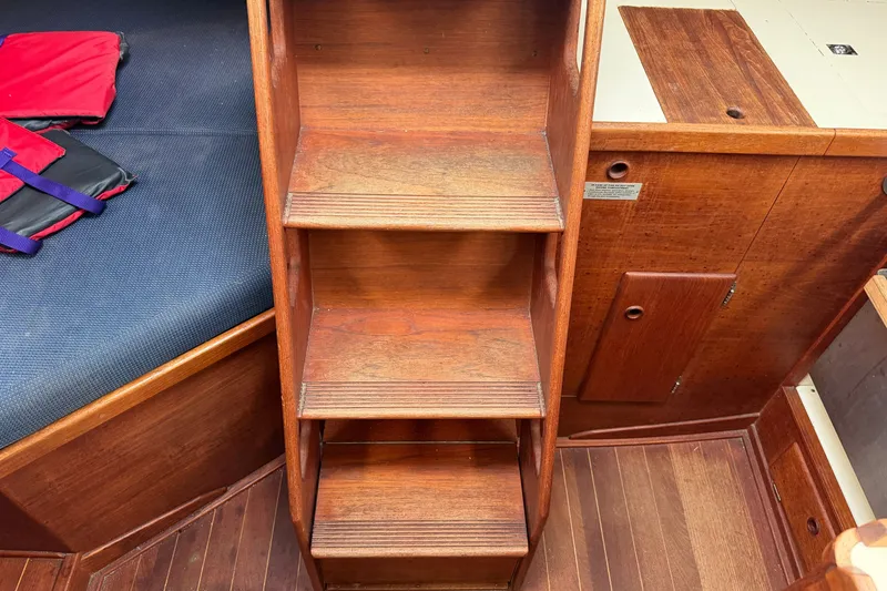 Slide: The Image of Wooden interior stairs of a 1990 Sabre 34 MK II sailboat cabin. - 62