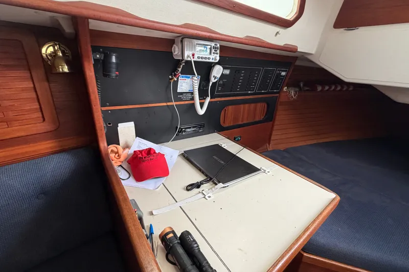 Slide: The Image of Interior of 1990 Sabre 34 MK II sailboat with navigation equipment and seating area. - 37
