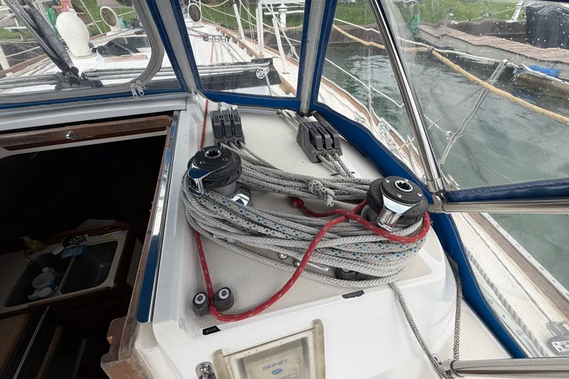 Slide: The Image of Cockpit of 1990 Sabre 34 MK II sailboat with ropes and winches. - 26