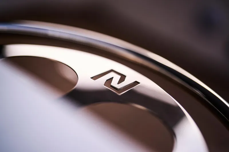 Slide: The Image of Close-up of Northman 1300 logo on metallic surface, 2025 model. - 29